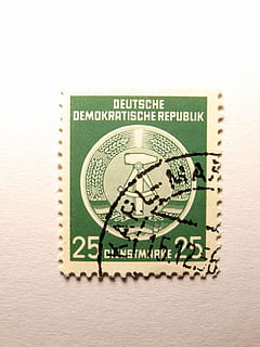stamp, ddr, dimed, post, communication, close-up, white background, green color, indoors, no people, postage stamp, studio shot, document, paper, text, cut out, safety, single object, sign, business, copy space, western script, law, still life, depression - sadness, ominous, 5K, CC0, public domain, royalty free