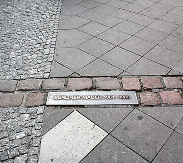berlin, germany, wall, text, communication, footpath, sign, western script, high angle view, day, stone, paving stone, no people, sidewalk, street, symbol, information, outdoors, guidance, city, road, tile, information sign, tiled floor, 2K, CC0, public domain, royalty free