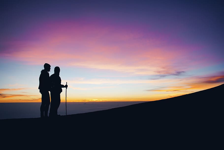 silhouette, man, woman, mountain, highland, cloud, sky, summit, ridge, landscape, nature, valley, people, hiking, climbing, travel, adventure, outdoor, sunset, men, outdoors, standing, two people, togetherness, cloud - sky, beauty in nature, adult, orange color, scenics - nature, love, positive emotion, land, tranquility, real people, full length, couple - relationship, 5K