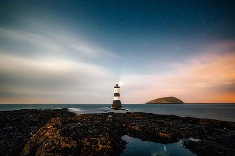 photo, white, brown, lighthouse, remote, sky, clouds, sunset, rocks, rocky, sea, ocean, water, dusk, evening, beautiful, hdr, tower, building exterior, built structure, horizon over water, architecture, cloud - sky, guidance, night, beach, nature, building, star - space, communication, land, rock - object, horizon, rock, no people, astronomy, 1080P, CC0, public domain, royalty free