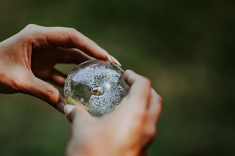 little, crystal ball, Woman, little crystal, female, hands, glass building, femine, nature, human Hand, holding, people, close-up, green Color, environment, outdoors, animal, human body part, one person, hand, focus on foreground, body part, day, selective focus, unrecognizable person, adult, environmental conservation, leisure activity, wet, finger, human limb, 4K