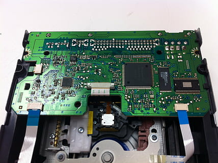 floppy disk drive, drive, computer, circuit board, electronics industry, technology, industry, computer chip, computer equipment, no people, green color, indoors, equipment, complexity, connection, computer part, machinery, close-up, studio shot, mother board, electrical component, electrical equipment, 2K, CC0, public domain, royalty free