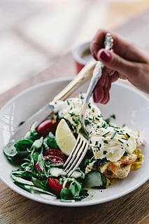 close, image, young, woman, eating, classic, breakfast, restaurant, Close up, morning, healthy, meal, eat, hungry, salad, tasty, eggs, yummy, food, plate, gourmet, healthy Eating, freshness, vegetable, dinner, close-up, crockery, food And Drink, lunch, appetizer, spinach, arugula, human body part, one person, hand, ready-to-eat, human hand, wellbeing, indoors, holding, focus on foreground, table, real people, finger, garnish, vegetarian food, 2K