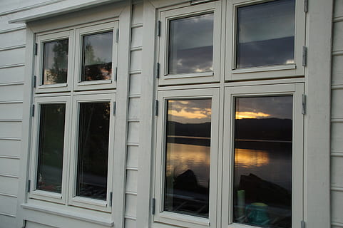 Window, Sunset, Reflection, Sea, Sun, glass - material, building exterior, outdoors, no people, built structure, architecture, building, transparent, day, house, open, residential district, window frame, business, nature, full frame, glass, 2K, CC0, public domain, royalty free