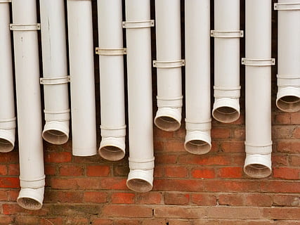 rain gutter, plastic, masonry, architecture, no people, built structure, pipe - tube, day, in a row, side by side, outdoors, water pipe, pipe, building exterior, repetition, wall - building feature, pattern, flooring, large group of objects, white color, pipeline, tile, rolled up, 2K, CC0, public domain, royalty free