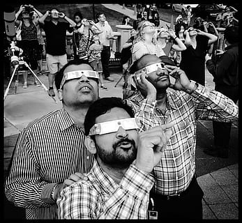 eclipse, solar eclipse, glasses, expression, looking up, sky, pov, symmetry, india, indian, men, point, black and white, real people, young men, leisure activity, lifestyles, people, art and craft, incidental people, casual clothing, young adult, portrait, adult, front view, representation, group of people, human representation, sculpture, creativity, waist up, facial hair, 2K, CC0, public domain, royalty free