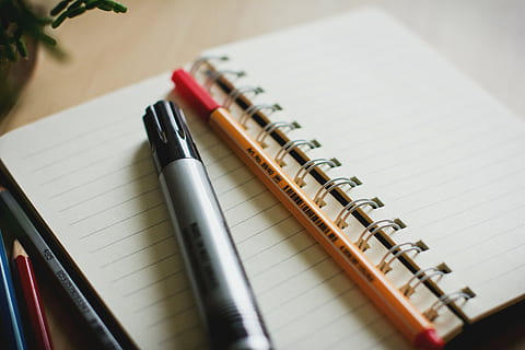 black, marker pen, spiral notebook, gray, pen, notebook, pencil, marker, notepad, writing, business, paper, indoors, no people, close-up, day, still life, note pad, education, publication, page, table, book, spiral, high angle view, writing instrument, blank, office supply, selective focus, fountain pen, 5K, CC0, public domain, royalty free