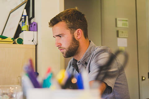 selective, focus photography, man, gray, shirt, sitting, front, white, desk, button, top, black, chair, guy, beard, office, working, supplies, business, people, indoors, only men, headshot, one person, selective focus, concentration, one man only, adults only, adult, mid adult, men, young adult, young men, portrait, occupation, looking, creativity, side view, design professional, 5K
