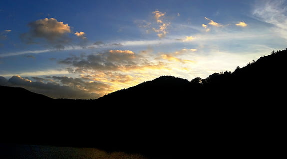 sunset, mountains, cloud, landscape, sun, view, peak, evening, outdoor, silhouette, hiking, nature, adventure, active, walking, backpack, hike, recreation, state parks, explore, camping, sky, cloud - sky, beauty in nature, tranquility, scenics - nature, tranquil scene, environment, mountain, non-urban scene, back lit, no people, idyllic, sunlight, land, tree, dramatic sky, dark, outdoors, 4K, CC0, public domain, royalty free