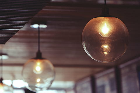 lit, clear, glass ball pendant lamp, glass, framed, string, light, lights, bulb, lighting, decor, lighting equipment, illuminated, light bulb, indoors, no people, close-up, day, hanging, focus on foreground, sphere, electricity, glowing, reflection, filament, light - natural phenomenon, ceiling, electric light, night, architecture, electric lamp, 5K, CC0, public domain, royalty free