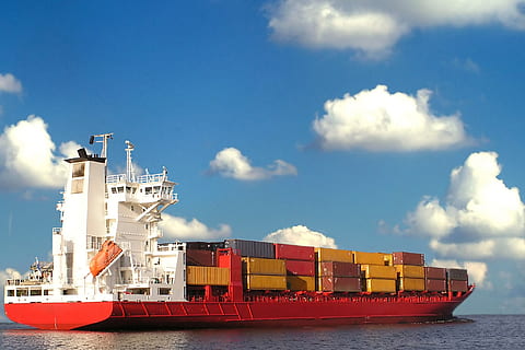 white, red, cargo ship, cargo, ship, container, commerce, ocean, international, transportation, trade, freight Transportation, cargo Container, shipping, nautical Vessel, container Ship, sea, harbor, industrial Ship, mode of Transport, industry, export, business, trading, carrying, commercial Dock, water, mode of transportation, cloud - sky, sky, architecture, nature, pier, no people, outdoors, 2K, CC0, public domain, royalty free