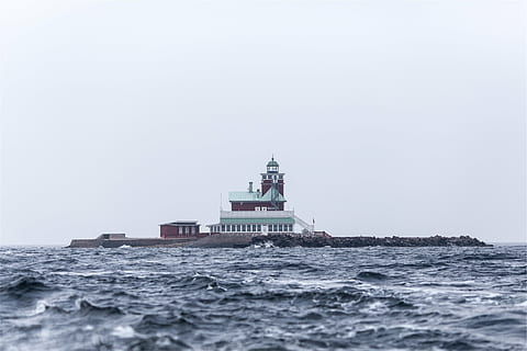 red, white, lighthouse, body, water, daytime, photo, house, near, ocean, building, coast, rocks, waves, sea, nautical vessel, transportation, day, outdoors, freight transportation, shipping, no people, motion, navy, architecture, nature, sky, built structure, building exterior, copy space, wave, travel destinations, ship, travel, 1080P