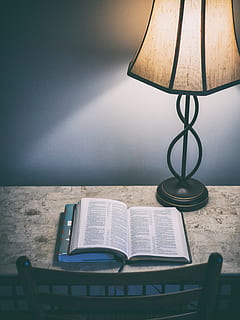 lamp, book, reader, table, chair, dark, night, light, indoors, publication, lighting equipment, electric lamp, wall - building feature, no people, education, shadow, home interior, paper, day, still life, nature, close-up, wood - material, furniture, sunlight, 4K, CC0, public domain, royalty free