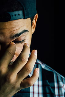 fashion, man, person, hand, adult, dark, depressed, face, guy, indoors, model, portrait, sad, sick, stress, studio, tired, wear, human body part, one person, human hand, body part, men, males, headshot, black background, close-up, human face, studio shot, communication, real people, mid adult men, front view, finger, obscured face, 5K