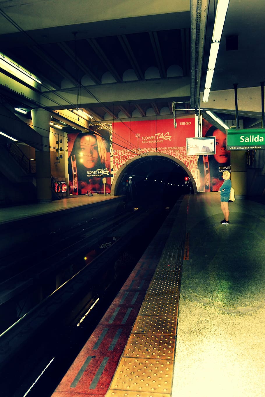 blur, light, motion, person, railway, signage, train, train station, transportation system, travel, tube, tunnel, waiting, woman, urban Scene, city Life, night, transportation, mode of transportation, rail transportation, public transportation, track, railroad track, architecture, illuminated, railroad station, built structure, railroad station platform, indoors, land vehicle, connection, train - vehicle, subway train, 2K