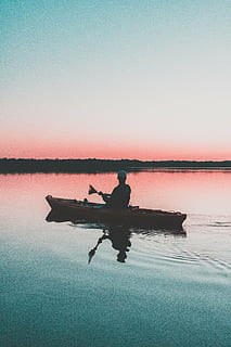 man, riding, kayak, flatwater, people, boat, sailing, paddle, fishing, sea, ocean, water, reflection, sunset, silhouette, tree, horizon, sky, one person, nature, tranquility, outdoors, clear sky, beauty in nature, waterfront, real people, scenics - nature, lake, nautical vessel, transportation, mode of transportation, tranquil scene, lifestyles, orange color, 5K