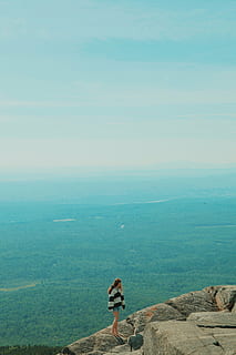 woman, standing, top, rock formation, wearing, striped, shirt, cliff, viewing, green, trees, daytime, people, girl, alone, hill, mountain, sky, blue, sea, day, real people, water, tranquility, full length, tranquil scene, outdoors, rock - object, nature, beauty in nature, scenics - nature, one person, leisure activity, lifestyles, idyllic, rock, 5K, CC0, public domain, royalty free