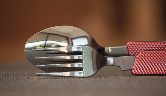 cutlery, fork, spoon, teeth, stainless Steel, equipment, steel, close-up, indoors, studio shot, no people, metal, single object, two objects, side view, wood - material, colored background, strength, still life, security, focus on foreground, business, occupation, work tool, adhesive tape, protection, aggression, spanner, 4K, CC0, public domain, royalty free