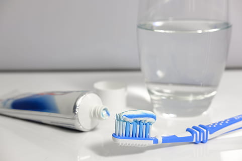 blue, white, toothbrush, beside, toothpaste soft-tube, toothpaste, brushing teeth, hygiene, clean, gift, tube, poison from the tube, fluoride, fluorides, sodium fluoride, salts, dentistry, dental care, dental hygiene, brush head, bristles, toothbrush head, tongue brush, healthcare and medicine, indoors, water, medicine, close-up, science, no people, bottle, household equipment, drinking glass, glass, white color, table, container, studio shot, plastic, medical supplies, care, 5K, CC0, public domain, royalty free