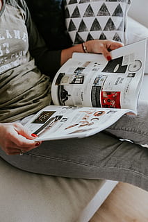 read, magazine, Woman, female, magazines, time, lifestyle, indoor, currency, people, paper Currency, holding, finance, business, newspaper, adults only, one woman only, one person, adult, only women, high angle view, midsection, real people, human hand, indoors, hand, women, table, human body part, lifestyles, technology, pen, occupation, nail polish, working, men, nail, finger, 5K