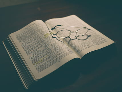 opened, book, eyeglasses, top, silver, framed, round, page, bible, reading, study, learning, proverbs, glasses, religion, finance, paper currency, no people, wealth, colored background, close-up, currency, black background, indoors, publication, high angle view, paper, text, table, open, still life, communication, education, western script, single object, shadow, focus on foreground, studio shot, blue background, 4K, CC0, public domain, royalty free