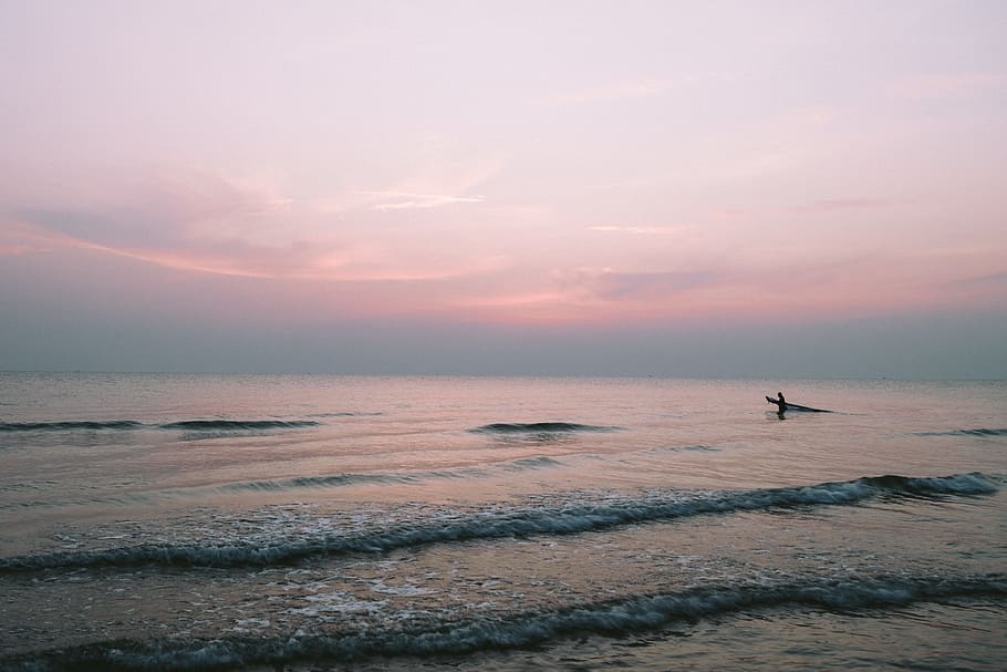 sea, dawn, nature, sky, beach, dusk, environment, horizon, idyllic, ocean, outdoors, peaceful, person, scenery, scenic, seascape, seashore, tranquil, water, waves, sunset, beauty in nature, land, surfing, horizon over water, cloud - sky, aquatic sport, wave, motion, scenics - nature, sport, people, tranquility, 4K