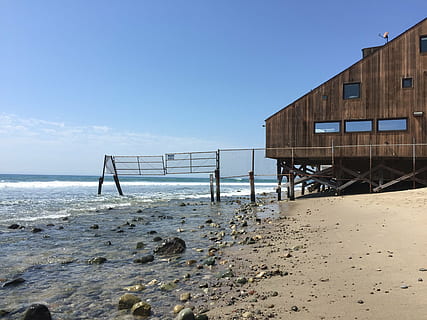beach, daylight, empty, house, island, ocean, outdoors, rocks, sand, sea, seascape, seashore, sky, water, waves, coastline, wood - Material, built structure, land, architecture, nature, tranquility, building exterior, scenics - nature, day, no people, beauty in nature, horizon over water, tranquil scene, horizon, wooden post, 2K