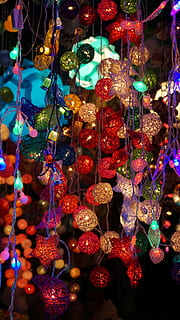 assorted-color string lights, turned, night time, lighting, light, bright, design, color, illuminated, shiny, backdrop, shine, blur, glow, lights background, effect, glowing, blue, abstract light, yellow, sky, white, vibrant, space, soft, colorful, sparkle, lamp, night, festive, holiday, pattern, electric, light background, lit, decoration, cultures, multi Colored, celebration, christmas, hanging, christmas decoration, christmas ornament, no people, for sale, lighting equipment, choice, close-up, abundance, variation, indoors, retail, retail display, 5K, CC0, public domain, royalty free
