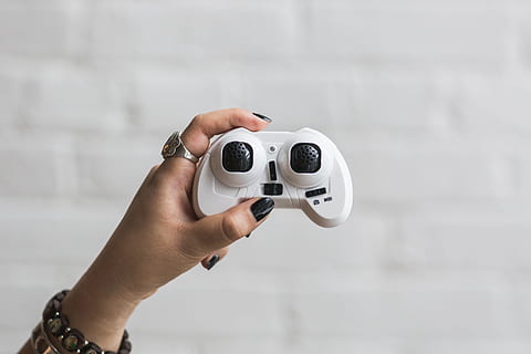 game, controller, hand, ring, bracelet, fashion, accessories, black, human hand, human body part, one person, technology, holding, indoors, copy space, adult, photography themes, close-up, focus on foreground, body part, arts culture and entertainment, lifestyles, camera - photographic equipment, occupation, mature adult, human limb, 4K, CC0, public domain, royalty free