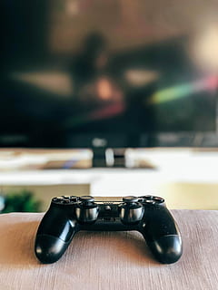 dept, field, photography, black, sony, ps4, dualshock, 4, controller, grey, cloth, shallow, focus photography, sony dualshock 4, close-up, indoors, table, focus on foreground, no people, black color, still life, selective focus, metal, wood - material, food and drink, day, gun, musical instrument, drink, business, refreshment, detail, handgun, 2K, CC0, public domain, royalty free