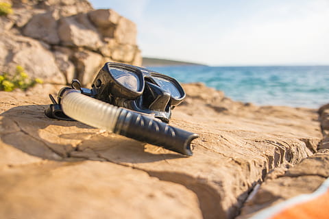 black, goggles, body, water, daytime, beach, diving, dive, summer, sea, happy, sun, snorkel, tourism, travel, outdoor, lifestyle, relax, vacation, island, relaxing, joy, dom, land, nature, rock, rock - object, solid, sand, sunlight, day, sky, outdoors, selective focus, close-up, no people, beauty in nature, sport, security, 5K, CC0, public domain, royalty free