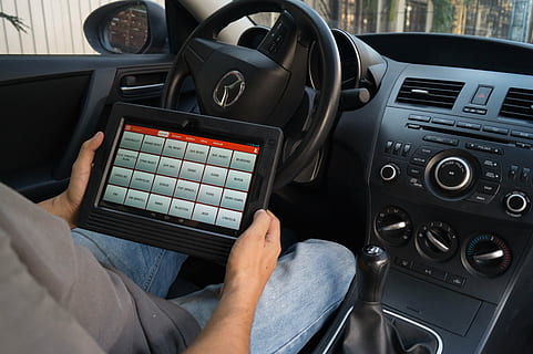 workshop, vehicles, maintenance, technology, control panel, mode of transportation, dashboard, transportation, vehicle interior, indoors, control, one person, men, communication, adult, motor vehicle, car, car interior, human hand, human body part, hand, mid adult, 5K, CC0, public domain, royalty free