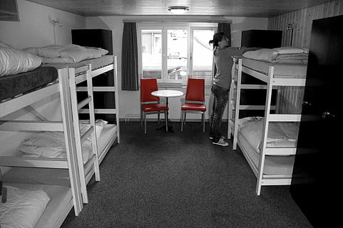 woman, standing, wooden, bunk bed, bed, room, hostel, eiger north face, grindelwald, eigerschlaf, seat, indoors, chair, furniture, table, absence, empty, architecture, flooring, no people, building, healthcare and medicine, education, built structure, illuminated, punishment, hospital, pillow, 4K, CC0, public domain, royalty free