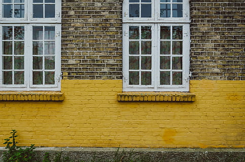 glass window panes, wall, clear, glass panel window, brown, concrete, brick wall, brick, paint, window, yellow, building, architecture, window frame, denmark, copenhagen, building exterior, built structure, residential district, wall - building feature, no people, day, house, outdoors, glass - material, closed, full frame, security, low angle view, apartment, 4K, CC0, public domain, royalty free