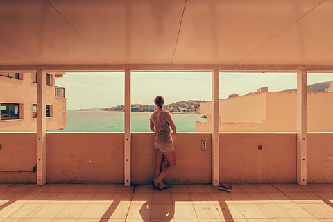 enjoying, view, coast, Man, Spain, people, holidays, summer, travel, vacation, women, lifestyles, indoors, females, men, one Person, adult, healthy Lifestyle, caucasian Ethnicity, exercising, young Adult, window, full length, one woman only, real people, architecture, standing, built structure, leisure activity, rear view, casual clothing, day, building exterior, young women, child, outdoors, flooring, hairstyle, 4K
