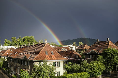 landscape photography, village, rainbows, Rainbow, Home, Bern, Clouds, Colorful, rain, spectacular, city, sunshine, rainbow colors, sky, weather, half circle, roof, color, switzerland, light, artfully, house, no people, built structure, building exterior, architecture, building, tree, residential district, beauty in nature, plant, nature, multi colored, scenics - nature, cloud - sky, idyllic, double rainbow, outdoors, roof tile, meteorology, 5K, CC0, public domain, royalty free