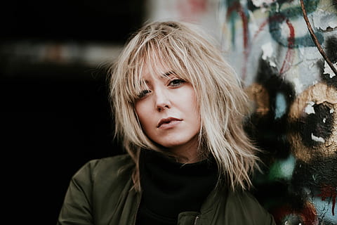 portrait, blonde, woman, brown, zip-up jacket, black, turtle neck, zip, up, jacket, black turtle, women, people, one Person, blond Hair, females, caucasian Ethnicity, young Adult, outdoors, beauty, urban Scene, adult, beautiful, city Life, lifestyle, lifestyles, young Women, fashion, headshot, one woman only, hair, hairstyle, front view, looking at camera, serious, sadness, emotion, long hair, bangs, child, contemplation, depression - sadness, teenager, hood - clothing, beautiful woman, black background, 5K, CC0, public domain, royalty free
