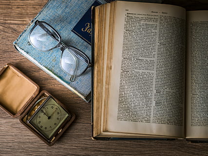 black, framed, eyeglasses, beside, book, knowledge, library, glasses, textbook, information, education, literature, stack, study, read, paper, bookshelf, open, school, wisdom, old, vintage, bookcase, cover, text, research, science, antique, bookstore, retro, print, university, wood, page, literary, wall, wooden, table, macro, close-up, closeup, clock, countdown, time, dial, hour, minute, watch, directly above, high angle view, indoors, no people, day, publication, still life, wood - material, communication, sunglasses, container, leather, personal accessory, 4K, CC0, public domain, royalty free