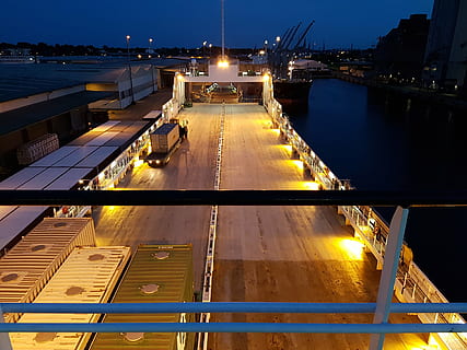 brown, wooden, ship, sea, frachtschiff, cargo, container, container ship, traffic, shipping, charging process, loading, transport of goods, goods, lübeck, port, transport, night, transportation, water, architecture, illuminated, built structure, nature, no people, connection, bridge, sky, mode of transportation, pier, building exterior, bridge - man made structure, river, nautical vessel, lighting equipment, high angle view, outdoors, light, 4K, CC0, public domain, royalty free