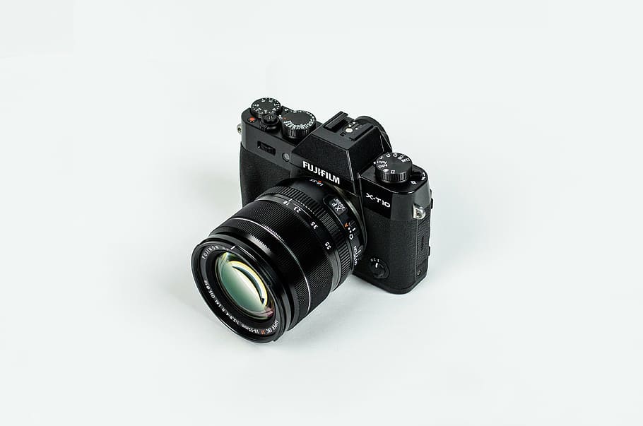 schwarze Fujifilm-Kamera, Kamera, Digital, Fotografie, Technologie, klassisch, Jahrgang, fujifilm, Fotografie-Themen, Kamera - Fotoausrüstung, Filmindustrie, weißer Hintergrund, Fotografieren, schwarze Farbe, Filmkamera, keine Leute, Studioaufnahme, Fotoausrüstung, Objektiv - optisches Instrument, drinnen, Spiegelreflexkamera, Linse - Auge, Digitalkamera, Nahansicht, ausgeschnitten, Stillleben, einzelnes Objekt, modern, Ausrüstung, Heimvideokamera, 4K