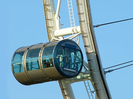 people, inside, black, blue, ferriswheel, black and blue, sky, industry, equipment, outdoors, technology, day, no people, clear sky, low angle view, nature, built structure, architecture, metal, sunlight, machinery, pole, mast, connection, water, amusement park ride, directly below, steel, 1080P, CC0, public domain, royalty free
