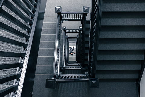 man, lying, floor, stairways, staircase, body, corpse, fall, accident, dead, hurt, high, stairs, person, building, construction, steps, interior, crime, fatality, murder, investigation, police, steps and staircases, architecture, built structure, railing, real people, indoors, high angle view, spiral, spiral staircase, one person, directly above, moving down, day, lifestyles, pattern, men, modern, full length, 4K, CC0, public domain, royalty free