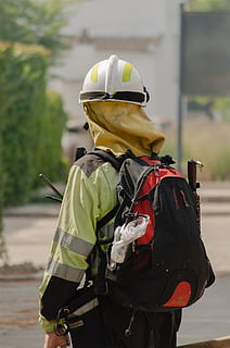 firefighter, fire, fire service, training, fireproof, forest, work, forest fire, clothing, real people, focus on foreground, safety, day, rear view, headwear, one person, occupation, uniform, protection, helmet, security, backpack, protective workwear, men, outdoors, standing, warm clothing, 1080P, CC0, public domain, royalty free