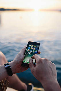 mobile, phone, man, hands, sea, Mobile phone, phone in, caucasian, summer, water, tech, technology, iphone, evening, outdoor, male, vacation, smartphone, device, cell, human Hand, holding, people, outdoors, wireless technology, only men, hand, human body part, real people, communication, lifestyles, sky, sunset, men, leisure activity, one person, nature, focus on foreground, finger, 5K