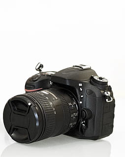 camera, foto, digitaal, doelstelling, fotografie thema's, camera - fotografische apparatuur, studio opname, witte achtergrond, zwarte kleur, fotografische apparatuur, kopie ruimte, technologie, stilleven, binnenshuis, detailopname, uitknippen, geen mensen, digitale camera, enkel object, modern, lens - optisch instrument, uitrusting, lens - oog, slr camera, 1080P, CC0, publiek domein, royaltyvrij