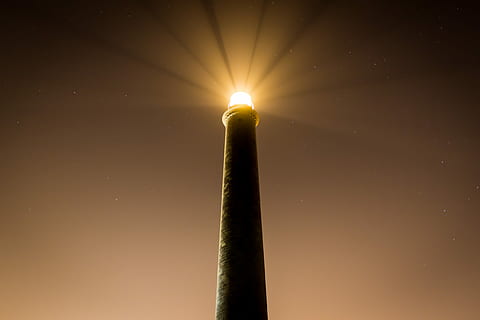 powered on lighthouse, turned, light, brown, architecture, lighthouse, sky, dusk, evening, illuminated, beacon, source of illumination, burning, fire, no people, fire - natural phenomenon, nature, flame, orange color, heat - temperature, bright, night, light - natural phenomenon, copy space, glowing, lighting equipment, brightly lit, yellow, low angle view, light beam, 4K, CC0, public domain, royalty free