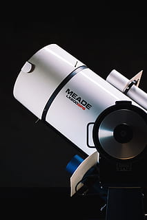 optical, instrument, microscope, technology, arts culture and entertainment, communication, indoors, text, no people, studio shot, close-up, western script, black background, still life, film industry, lighting equipment, audio equipment, music, photographic equipment, photography themes, equipment, copy space, 4K, CC0, public domain, royalty free