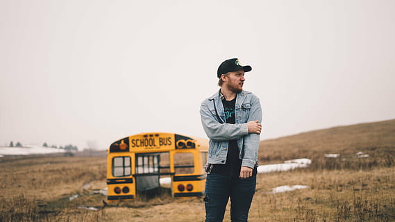 man, standing, yellow, school bus, daytime, guy, school, bus, field, glass, sky, beard, cap, nature, jacket, cold, mid adult, mid adult men, one person, casual clothing, adult, adults only, one man only, rural scene, outdoors, people, hat, transportation, men, mode of transportation, day, clothing, copy space, lifestyles, three quarter length, leisure activity, 5K, CC0, public domain, royalty free