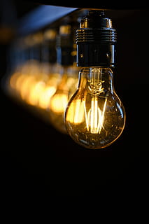 selective, focus photography, turned, light bulb, lamp, light, lighting, bulbs, edison light bulb, edisson, led, technology, retro, nostalgia, energy, current, voltage, glass - material, close-up, indoors, transparent, lighting equipment, illuminated, focus on foreground, no people, glowing, electricity, container, still life, fuel and power generation, studio shot, filament, table, black background, single object, glass, 4K