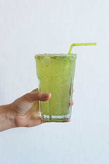 homemade, cucumber lemonade, Glass, cucumber, lemonade, drink, hands, juice, fruit, cocktail, freshness, refreshment, green Color, ice, food, human body part, human hand, holding, one person, white background, hand, food and drink, household equipment, unrecognizable person, real people, drinking glass, indoors, straw, studio shot, lifestyles, body part, finger, 5K